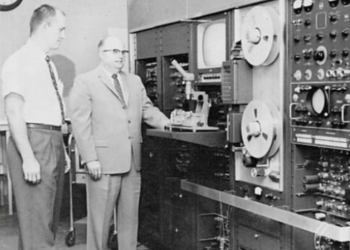 Engineers inspecting KFSD-TV's first videotape recorder in 1960.